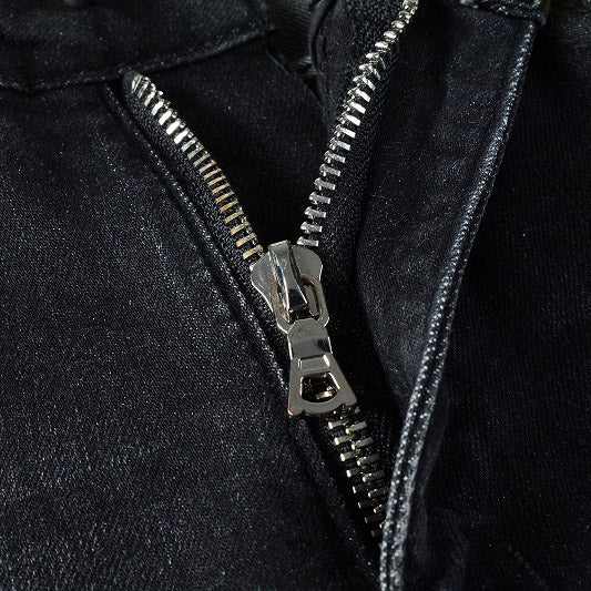 AMIRI Patchwork Slim Jeans – Full Logo Distressed Denim