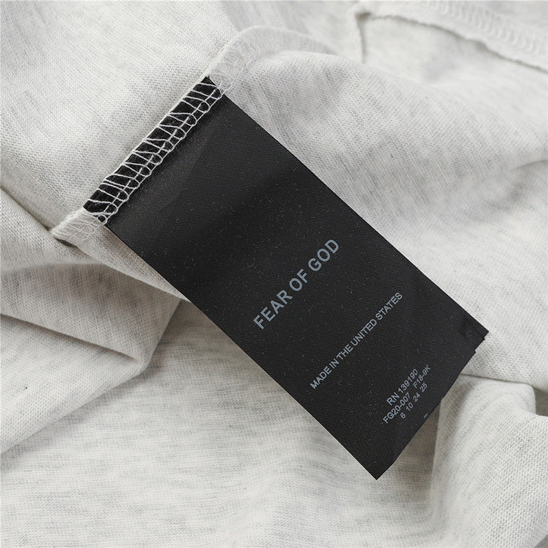 Fear of God Flocked G Letter Pattern T-Shirt – Black / Light Grey / Apricot