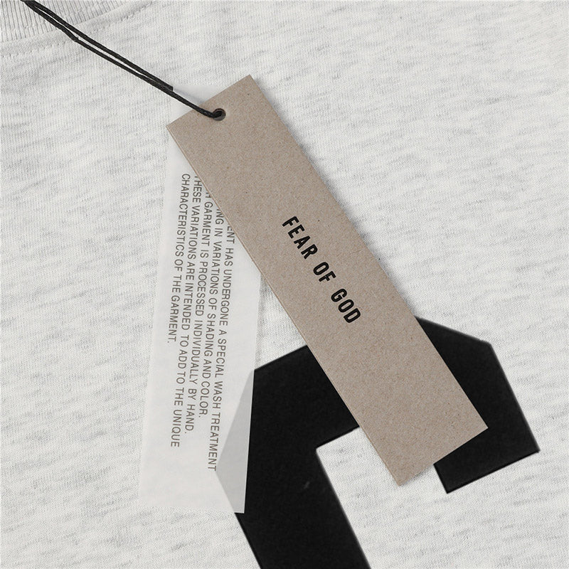 Fear of God Flocked G Letter Pattern T-Shirt – Black / Light Grey / Apricot