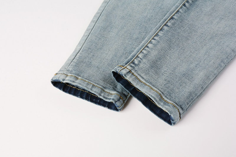 AMIRI Slim Fit Distressed Jeans – Full Logo Denim