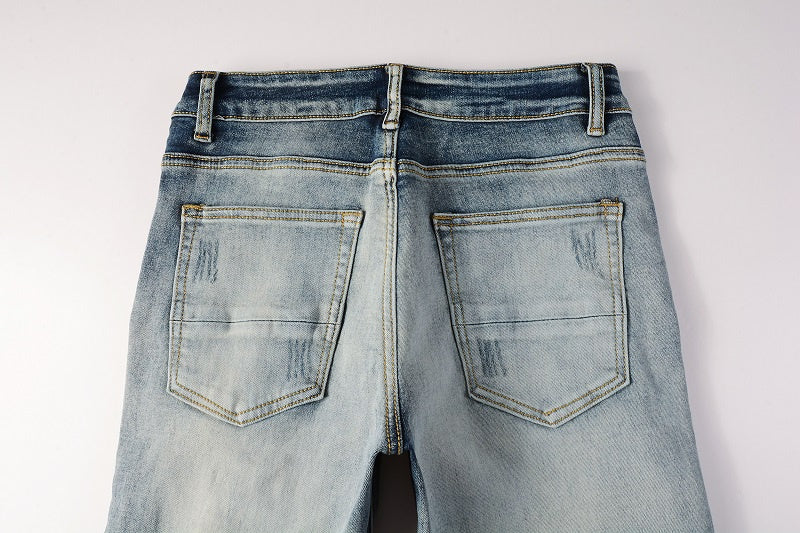 AMIRI Slim Fit Distressed Jeans – Full Logo Denim