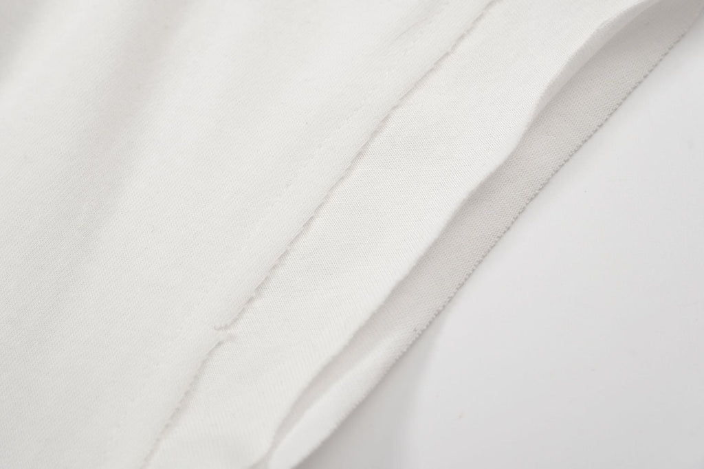 Fear of God × RRR123 INRI Cut Off Tee – White / Grey