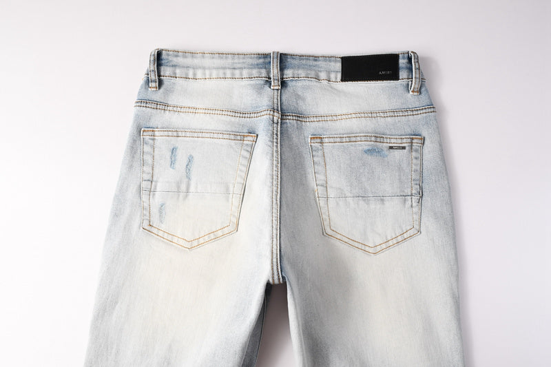 AMIRI Skinny Fit Jeans – Logo Patch Denim