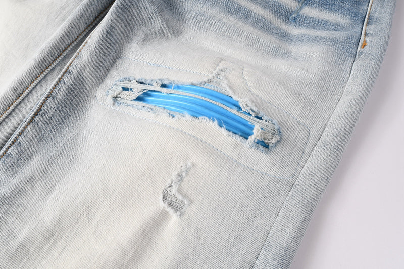 AMIRI Skinny Fit Jeans – Logo Patch Denim
