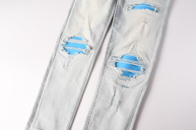 AMIRI Skinny Fit Jeans – Logo Patch Denim