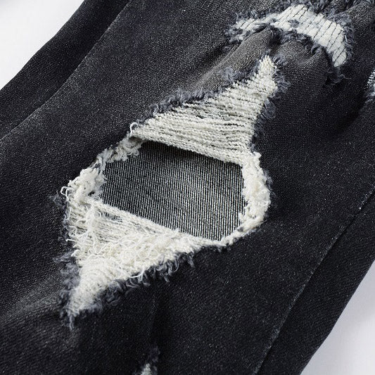 AMIRI Patchwork Slim Jeans – Full Logo Distressed Denim
