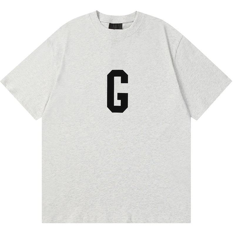 Fear of God Flocked G Letter Pattern T-Shirt – Black / Light Grey / Apricot