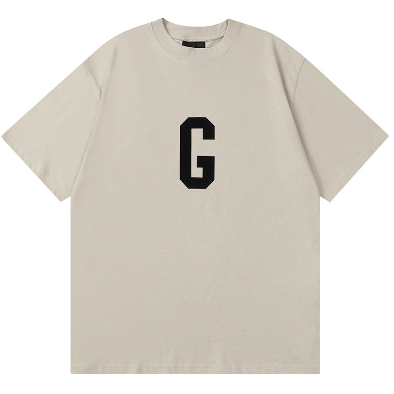 Fear of God Flocked G Letter Pattern T-Shirt – Black / Light Grey / Apricot