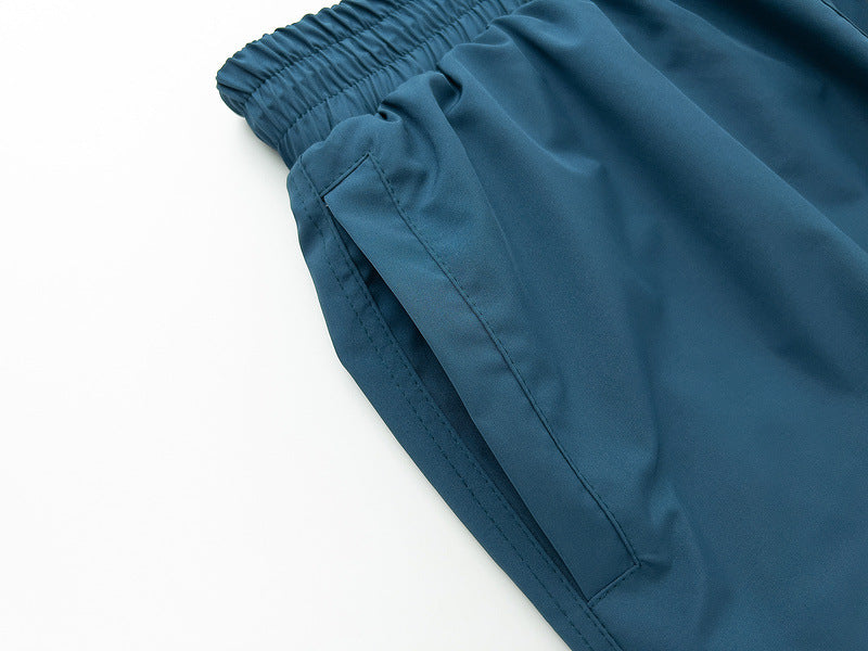 RHUDE Embroidered Tie Elastic Track Shorts – Blue