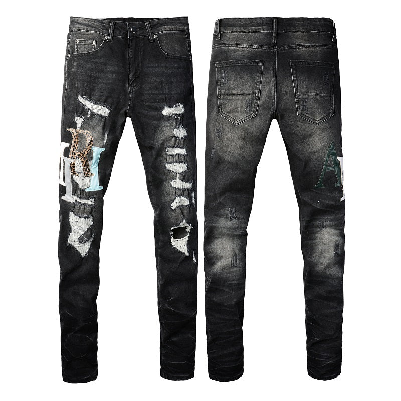 AMIRI Patchwork Slim Jeans – Full Logo Distressed Denim